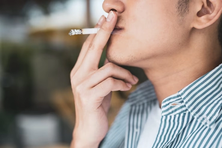 1.close-up-asian-young-man-smoking-cigarette_103324-810